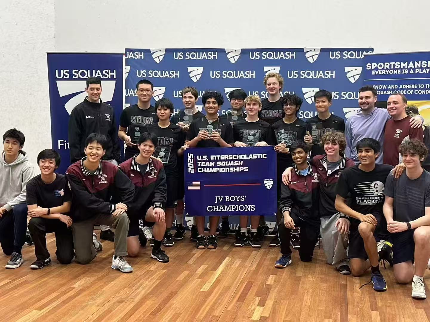 Calvin with the Conestoga squash team